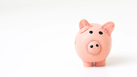 pink ceramic piggy bank; image used for blog post about determining if a scholarship is tax-free or taxable
