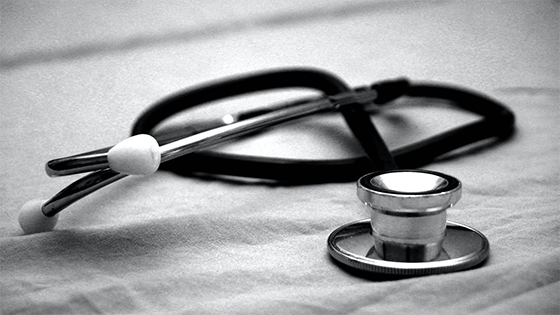 black and white photo of a doctor