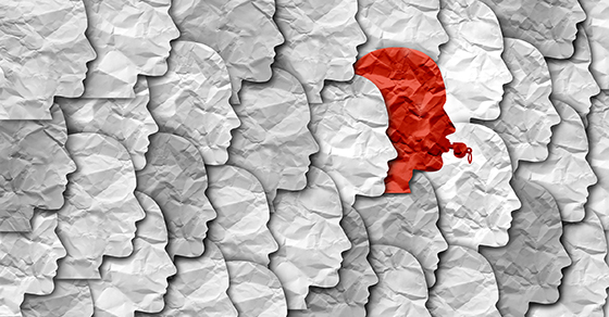white paper cutouts of heads and one red cutout blowing a whistle; image used for blog post about whistleblower policies for not-for-profits