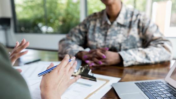 A photo of a military veteran being interviewed for a job; image used for blog post about hiring veterans for not-for-profits